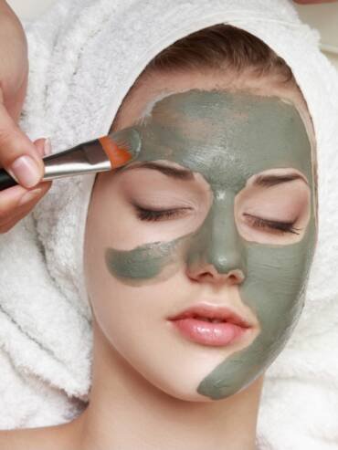 Applying Mask on Client's Face - Facials